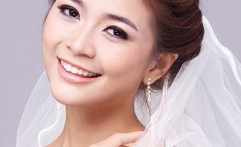 Tóc cô dâu búi thấp đẹp dịu dàng - Blog Marry