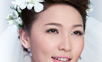 Tóc cưới kiểu đánh rối búi cao cá tính - Blog Marry